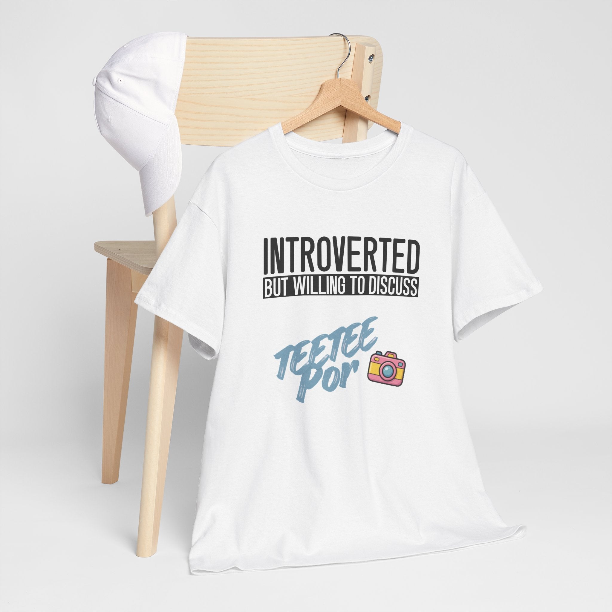 White Introverted TeeteePor slogan tee displayed on a wooden hanger
