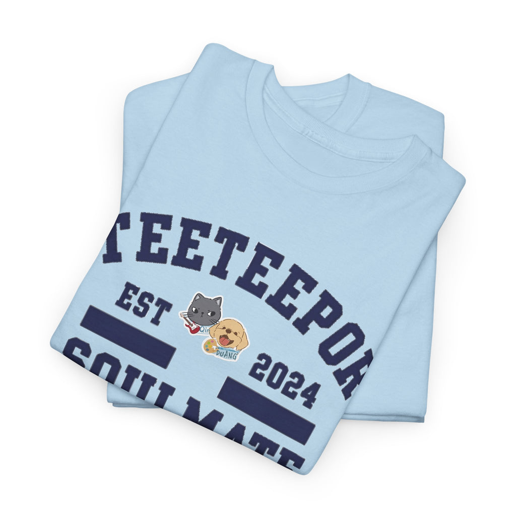 Folded Light Blue TeeteePor Soulmate Program varsity tees showing the navy print