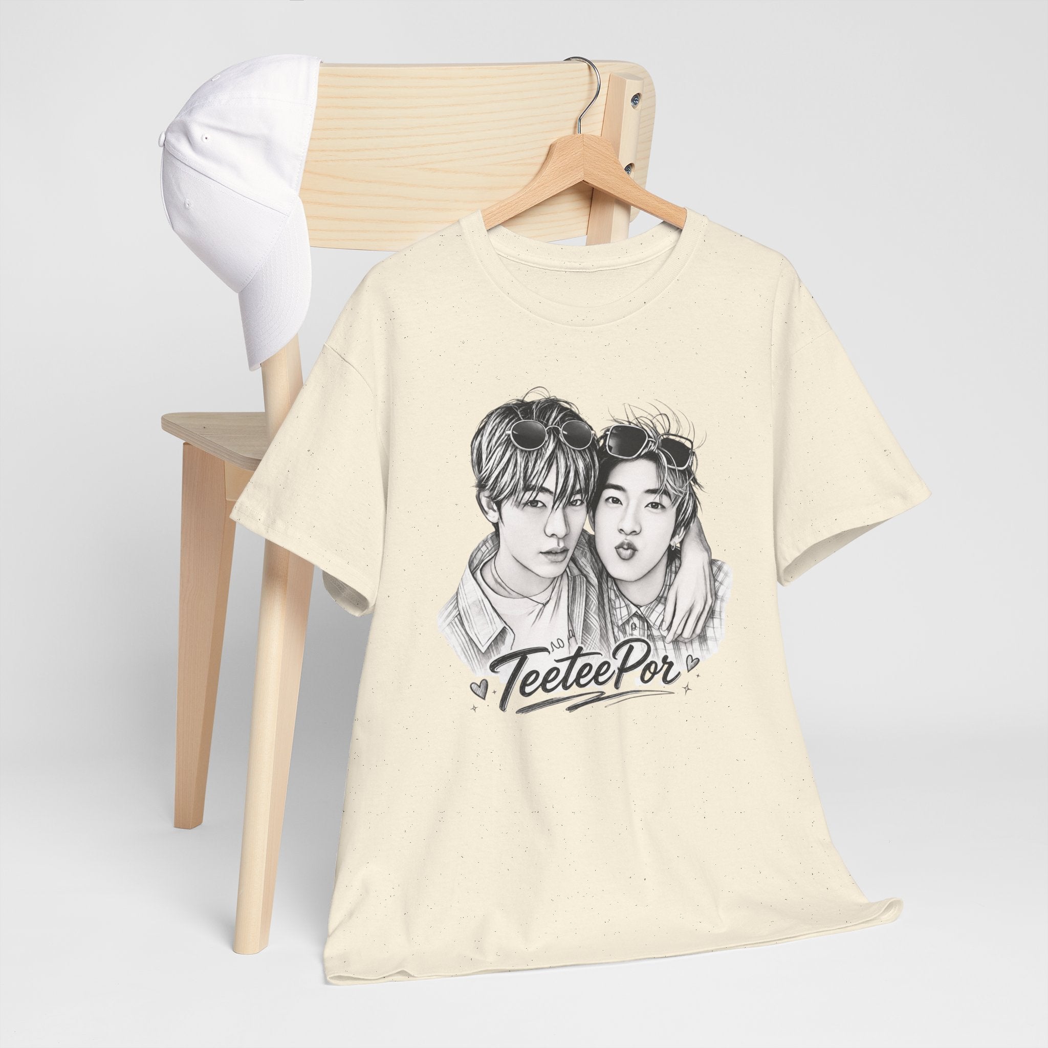 Folded natural TeeteePor sketch t-shirt, front view — TeeTee and Por, Duang With You Thai BL fan merch