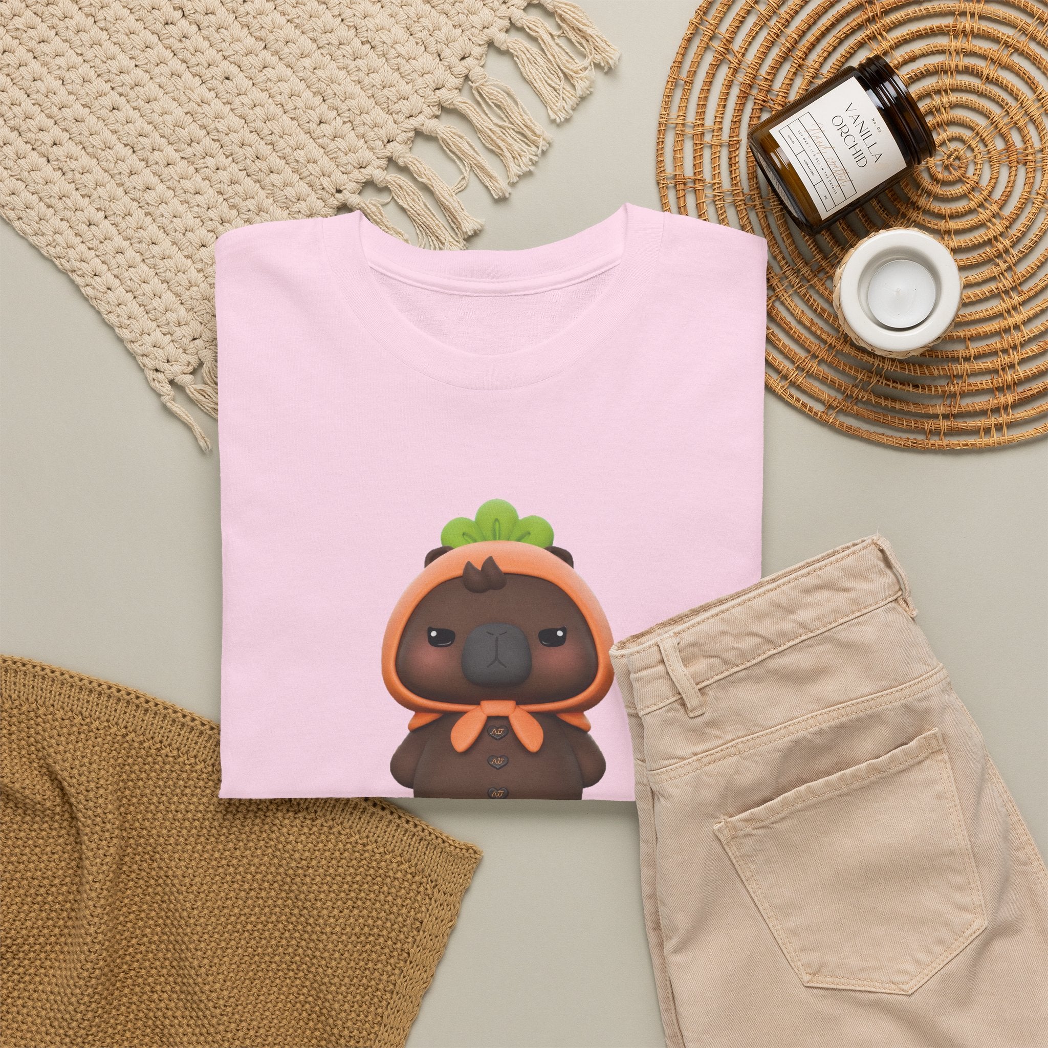 Light pink NetJJ JookKroo mascot t-shirt styled flat with chinos and coffee — Thai BL fan merch