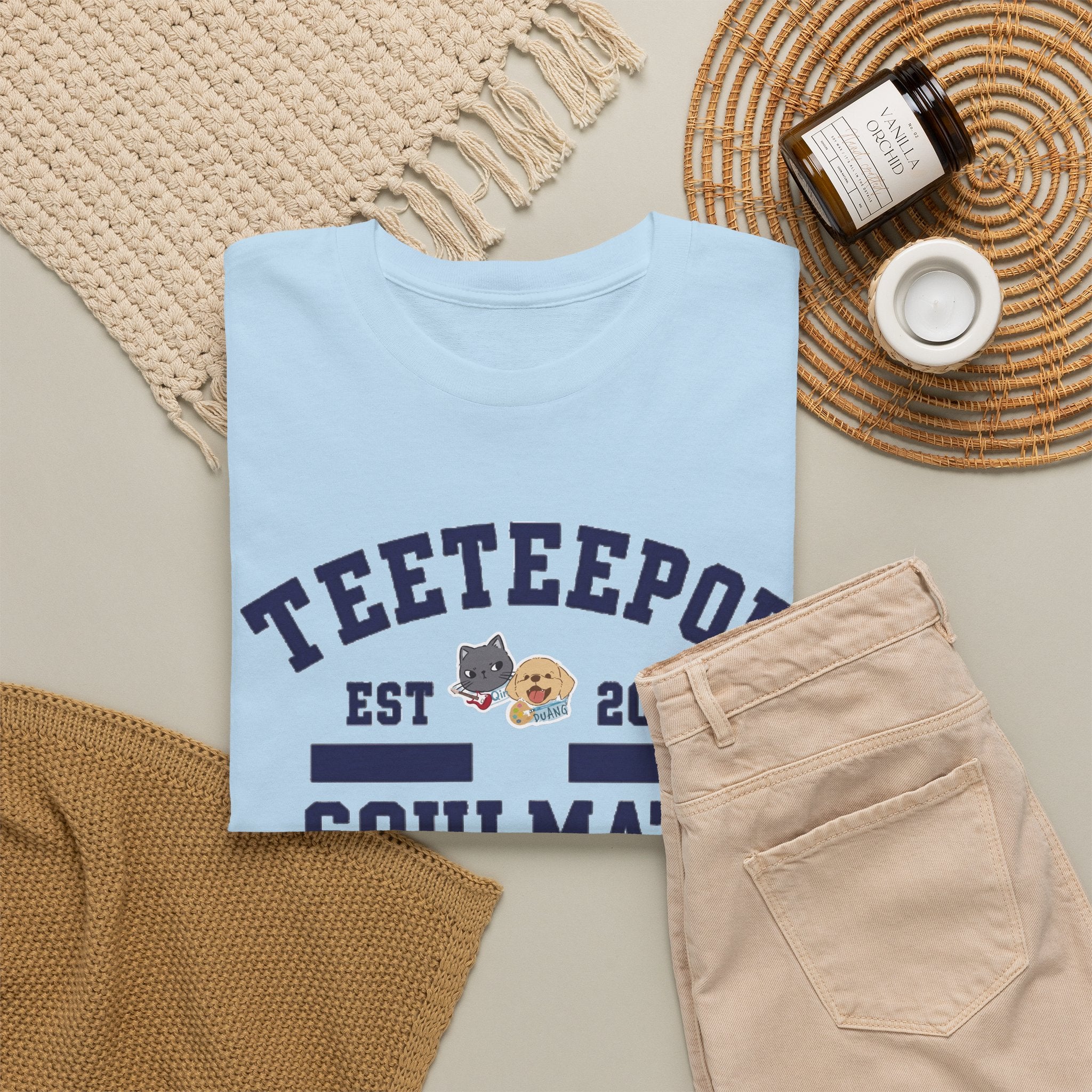 Light Blue TeeteePor Soulmate Program tee, flat-lay styled with neutral props