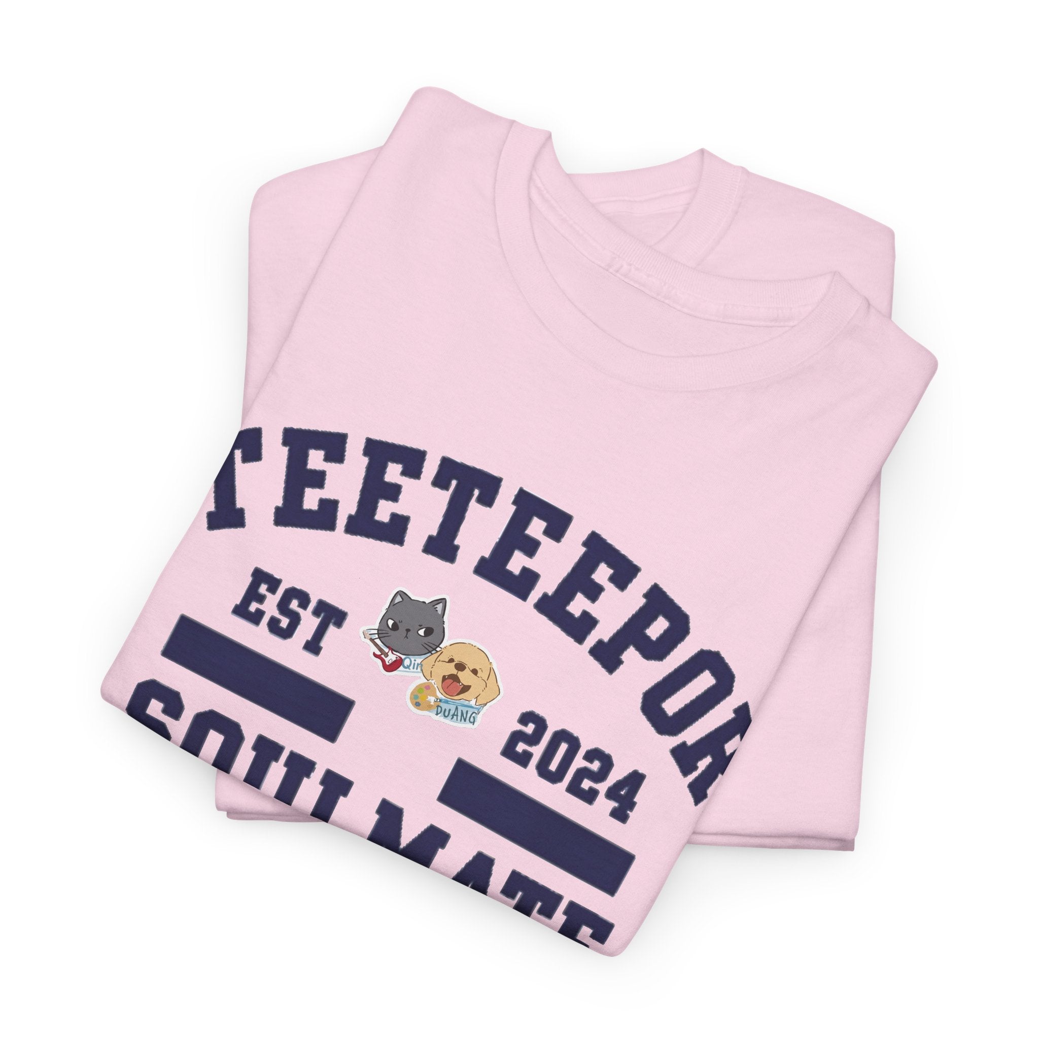 Folded Light Pink TeeteePor Soulmate Program varsity tees showing the navy print