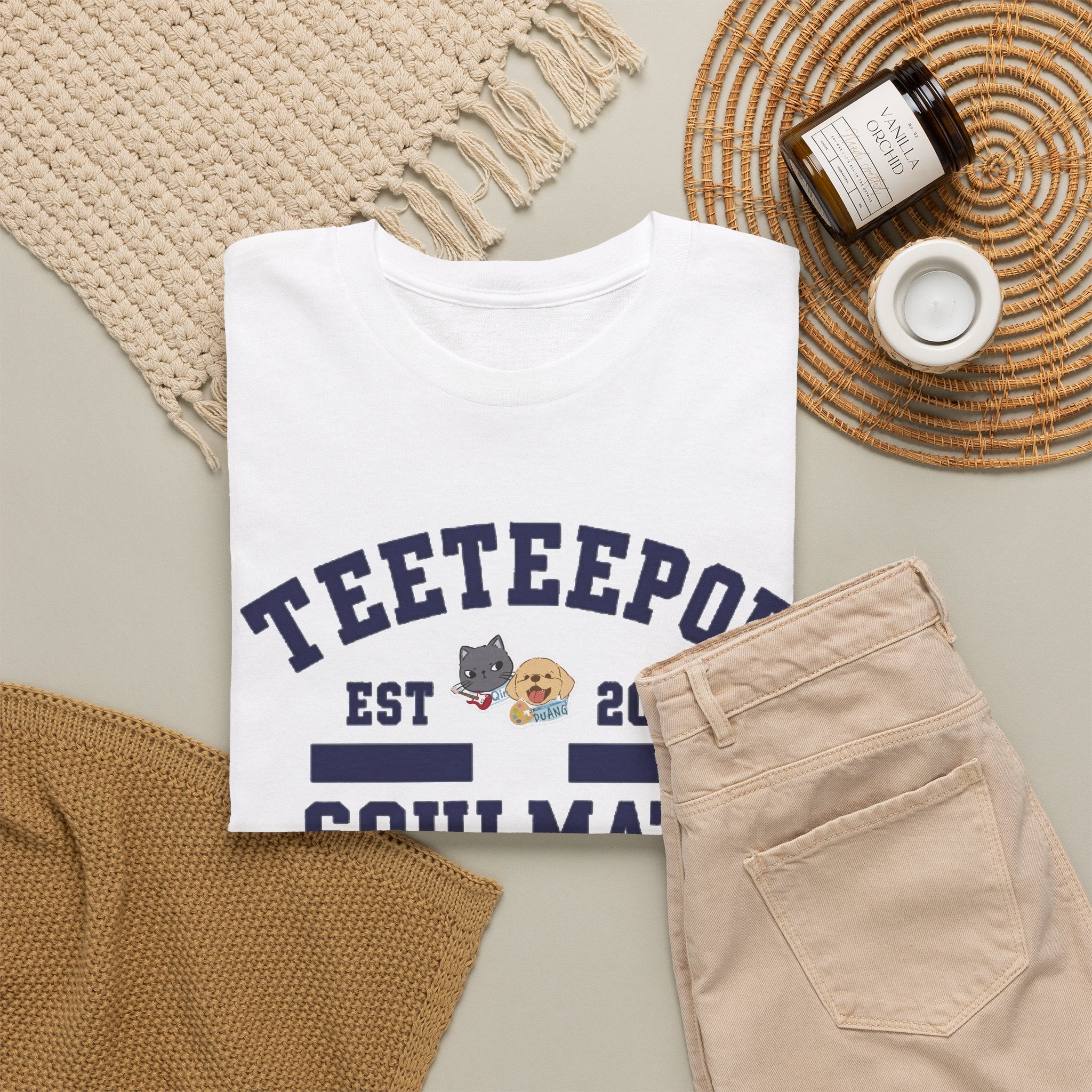 White TeeteePor Soulmate Program tee, flat-lay styled with neutral props