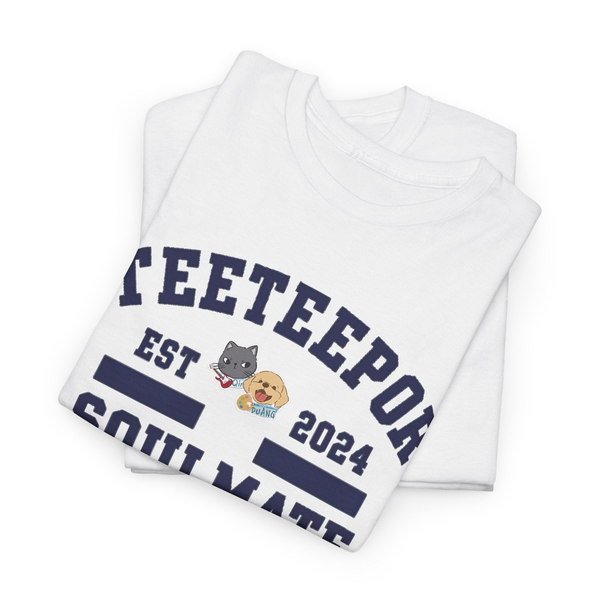 Folded white TeeteePor Soulmate Program varsity tees showing the navy print