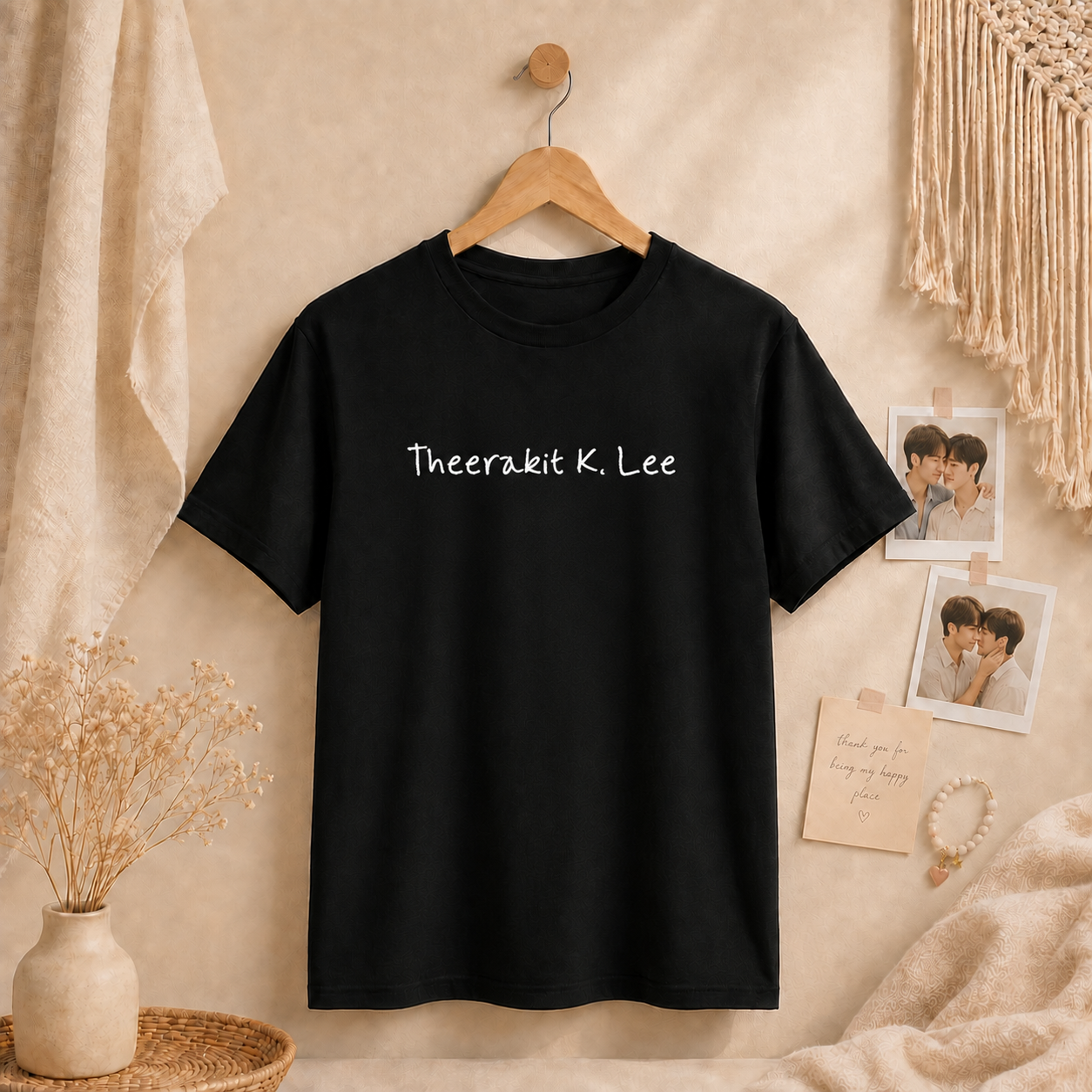 Close-up of the handwritten Theerakit K. Lee print on a Me and Thee fan t-shirt